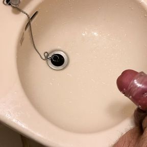 Small Penis With A Vibrator Sleeve Cumming And Pissing On Sink