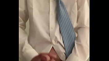 Twink jerking off in formal outfit