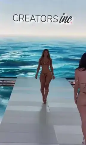broad shot of my runway walk in the giraffe swimsuit
