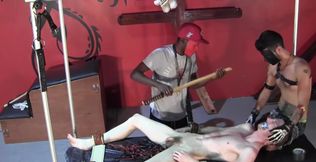 Busting the balls of the submissive man in the dungeon