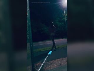 Slender Cd walking on public road