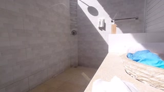 Couple showering after pool