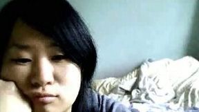 Cute Asian girlfriend from Tokyo flashes her round butt on webcam