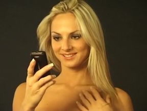 Hot blonde babe with big tits strips down