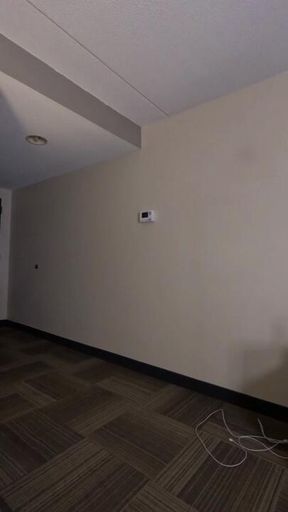 Double booked hotel room with a flight attendant