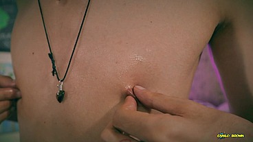 Playing with my nipples, oil and clamps.