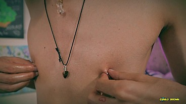 Playing with my nipples, oil and clamps.