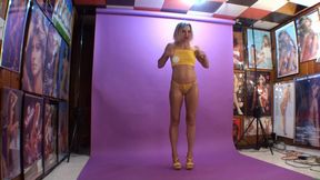 Unedited BTS video of Lora Cross modeling in lingerie and topless then showing off her bare soles