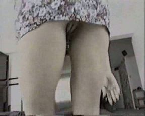 Bodacious aunt of my wife flashes her upskirt pussy while cleaning