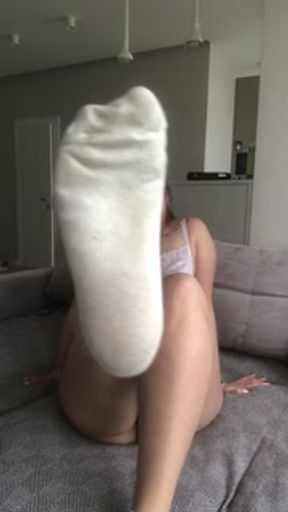 Busty Goddess wets her dirty white socks