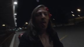 Midnight whore CD is walking around a car parking lot lookking to get lucky