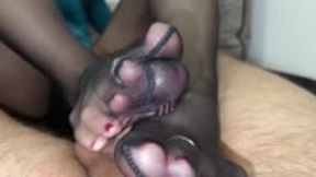 2hotfeet4you - Post-cum handling footjob in ripped nylons