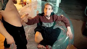 Two Sweet Guys Share An Inflatable Chair