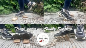Leaving Muddy Footprints on Slices of Toast Bread under Chunky Sneakers