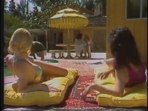Hot babes enjoy as they give a huge pole a blowie outdoors then get fucked