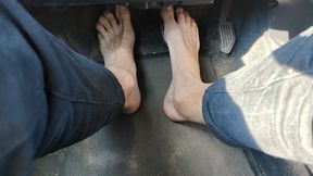 Riding a car barefoot with my long and skinny feet naked above the pedals