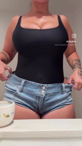 Female Onlyfans Model in Black Tank Top