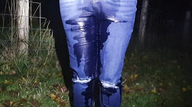 British blonde soaks her jeans in public car park