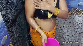 Indian Desi Bhabhi Bathing And Removing Her sexy saree.